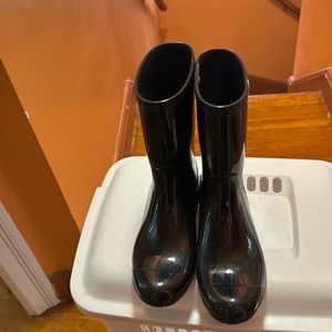 Black Ugg rain boots.  Only worn twice.  Ugg lining inside. Warm.